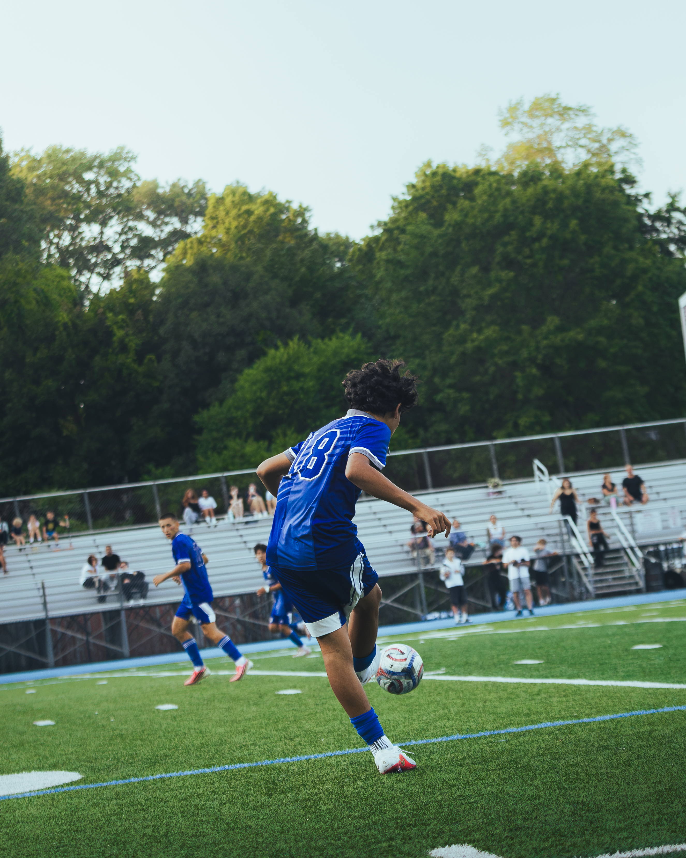 Soccer player dribbling during a match