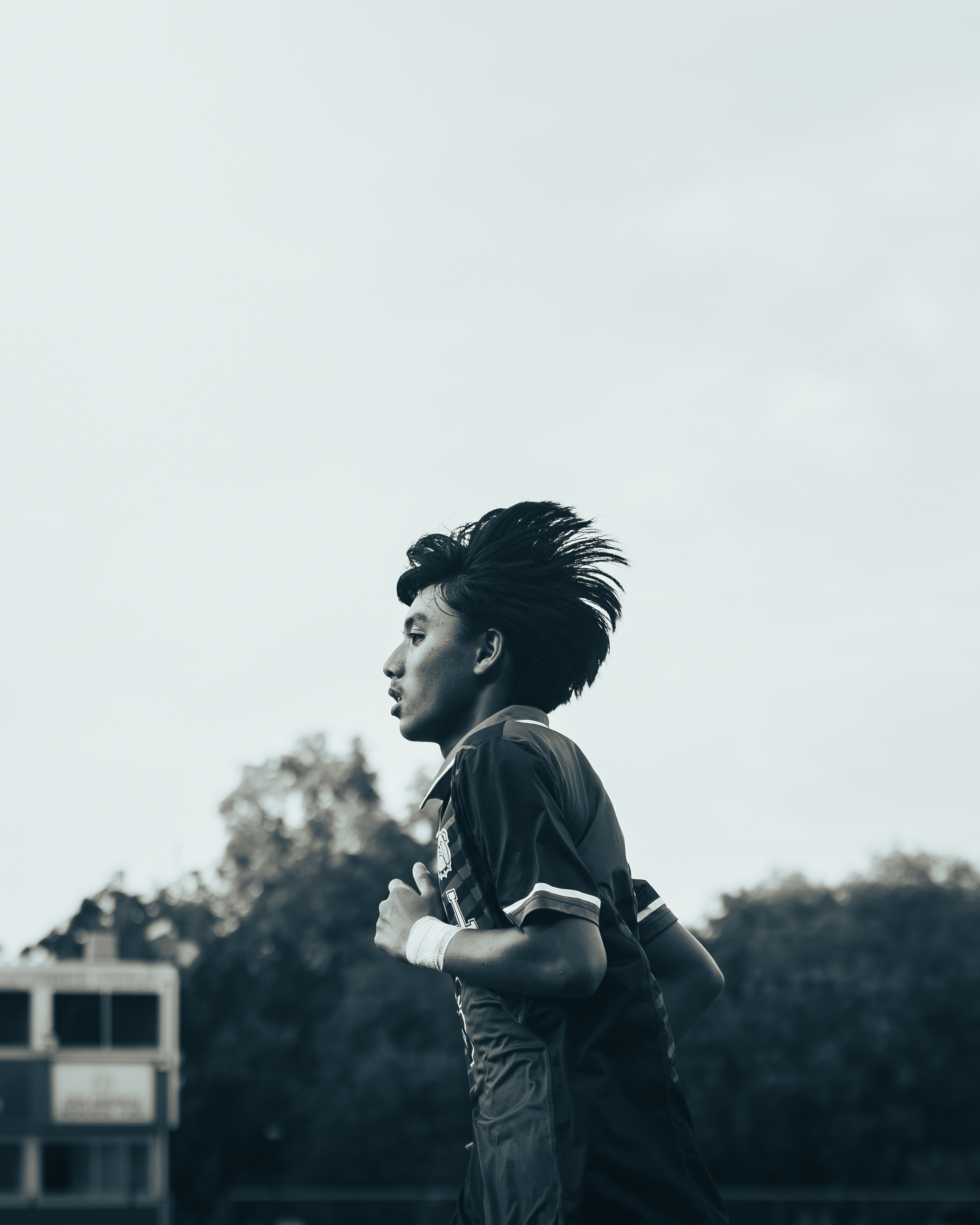 Black and white portrait of an athlete in motion